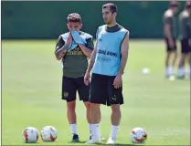  ??  ?? Arsenal’s Armenian midfielder Henrikh Mkhitaryan (right) with teammate Lucas Torreira attend a training session at Arsenal’s Colney training centre in St. Albans on Tuesday, ahead of their Europa League final match against Chelsea on May 29.
