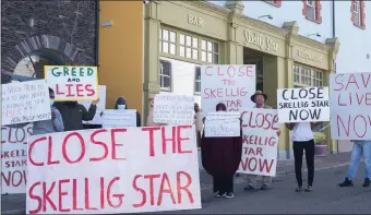 ?? Photo by Christy Riordan. ?? The protest on Tuesday morning outside the Skellig Star Direct Provision Centre in Cahersivee­n, where asylum seekers have gone on hunger strike.