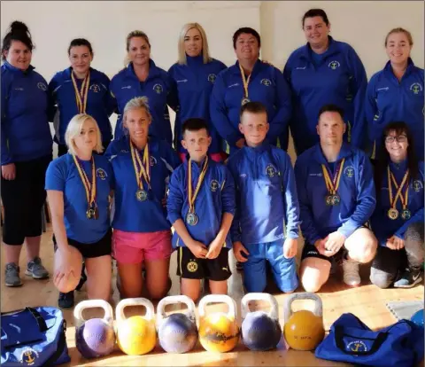  ??  ?? Rosslare Kettlebell Club members with the spoils of their recent successes.