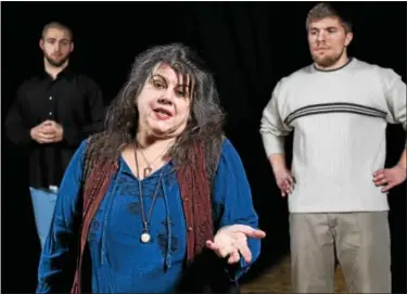  ?? PHOTO BY JOHN DAGGETT ?? JJ Van Name, center, Stephen Waters, left, and Sebastian Antomio are shown in a scene from “The Laramie Project” which opens March 10at Steel River Playhouse in Pottstown.