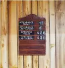  ??  ?? A board in Peakland Baptist Church shows attendance and collection numbers. The church is trying to rebuild after a fire in 2019 and the revelation in August that two church members allegedly stole nearly $84,000 in church funds.