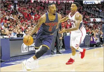  ?? KEVIN C. COX / GETTY IMAGES ?? Cleveland’s J.R. Smith drives against Atlanta’s Jeff Teague during the first half of Game 1 in the Eastern Conference finals. Smith made 8 of 12 3-point attempts and finished with 28 points in the Cavaliers’ win.