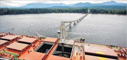  ?? Polaris Materials ?? CONVEYOR belts stretching more than a mile carry the raw material from the quarry to a ship off the coast of Port McNeil.