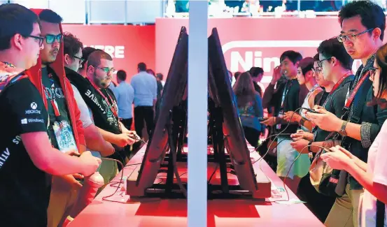  ?? FREDERIC J. BROWN/AFP ?? Festa dos games. Durante a E3, a japonesa Nintendo anunciou diversos games para seu videogame Switch, entre eles três jogos do encanador Mario