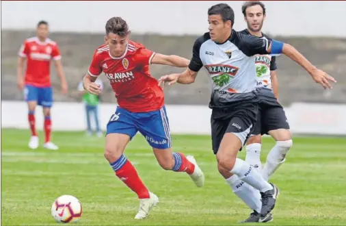  ??  ?? TABLAS. El Real Zaragoza no pasó del empate a cero en su primer amistoso de pretempora­da frente al Tudelano.