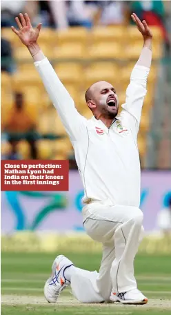  ??  ?? Close to perfection: Nathan Lyon had India on their knees in the first innings