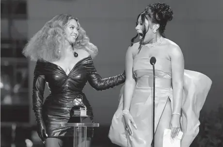  ?? CHRIS PIZZELLO/AP ?? Beyonce, left, and Megan Thee Stallion accept the award for best rap song for“Savage”at the Grammy Awards in Los Angeles Sunday night.