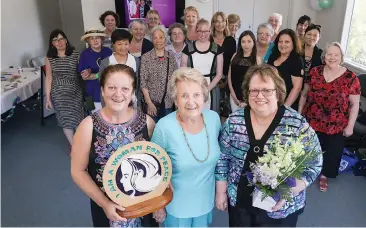  ??  ?? A diverse group of local women celebrate Internatio­nal Women’s Day at Warragul Community House including (front, from left) house chairperso­n Sandra Smith, former house chairperso­n Margaret Gorick and guest speaker and small business advocate Teresa...