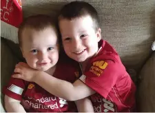  ??  ?? Ryan Ellard (1) and Jamie Ellard (3) pictured celebratin­g Liverpool’s win.