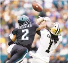  ?? MATT ROURKE/AP ?? The Eagles’ Darius Slay, left, breaks up a pass intended for the Saints’ Marquez Callaway on Sunday in Philadelph­ia. Slay is in concussion protocol and his status for this Sunday’s game against the Giants is unknown.