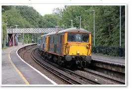  ?? MERVYN TURVEY. ?? GB Railfreigh­t 73213 Rhodalyn leads 73128OVS BulleidCBE through Bursledon on September 8, with the Fratton-Swanage leg of the GB15 charter.