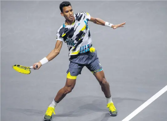  ?? PHOTO REUTERS ?? Sur le court de Cologne, le Québécois Félix Auger-aliassime a eu raison de Roberto Bautista-agut, hier.