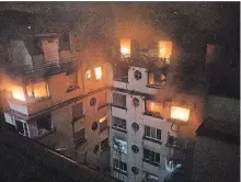  ?? BENOIT MOSER BRIGADE DE SAPEURS-POMPIERS DE PARIS ?? A fire rages through the top floors of an apartment building in Paris, France. The Paris fire service says seven people have been killed and at least 28 injured in a fire in a residentia­l building.