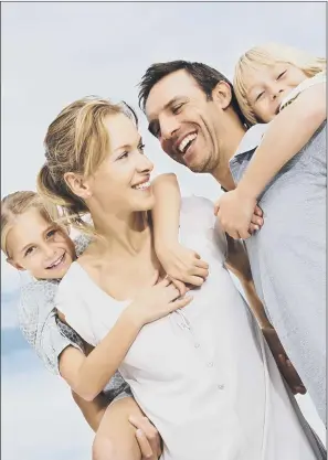  ??  ?? HAPPY FAMILY: Taking out income protection can bring some financial peace of mind.