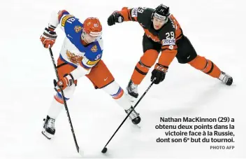  ??  ?? Nathan MacKinnon (29) a obtenu deux points dans la victoire face à la Russie, dont son 6e but du tournoi.