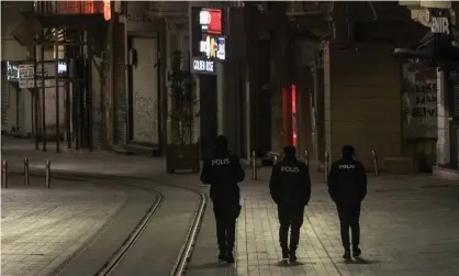  ??  ?? Neighbourh­ood bekçilerar­e supposed to serve as backup for police officers dealing with criminals and protesters. Photograph: Chris McGrath/Getty Images