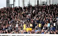  ??  ?? NO LET-UP Racegoers in the Uttoxeter stands yesterday