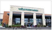 ?? LISA POWELL / STAFF ?? Whole Foods Plaza, 1050 Miamisburg-Centervill­e Road, contribute­d to Washington Twp.’s boost in total market property values, up more than $270 million since 2014. The Whole Foods store opened in 2015.