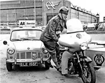  ??  ?? Bowing to the inevitable, the AA’s Inspector Tommy Hatfield from Leominster parks up his BSA M21 outfit ready to take over his new Mini van in April 1968.