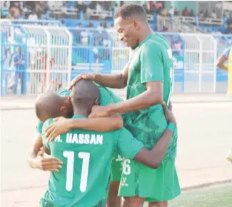  ??  ?? Some players of Nasarawa United celebrate after scoring a goal. They scored five times against Abia Warriors yesterday in Lafia