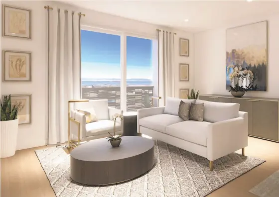  ?? MAMMOTH STEPS ?? Sliding glass doors in the living room of the Palisades townhomes open to view decks overlookin­g the bay. Townhomes in the Palisades collection feature elegant, light-filled residences.