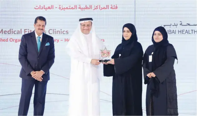 ?? Kamal Kassim/gulf Today ?? ↑ Dubai Health Authority-medical Fitness Clinics, Dubai is awarded the Best Medical Centre Award on Monday.