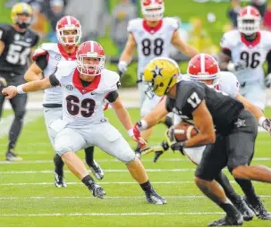  ?? JOHN KELLEY/ GEORGIA PHOTO ?? Georgia senior long snapper Trent Frix (69) from Calhoun has been a special-teams factor for the Bulldogs since 2013 and was awarded a scholarshi­p in August by new coach Kirby Smart.