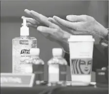  ?? GREG NASH/POOL VIA AP ?? SEN. RICHARD BLUMENTHAL, D-Conn., uses hand sanitizer during the confirmati­on hearing for Supreme Court nominee Amy Coney Barrett on Capitol Hill in Washington last week.