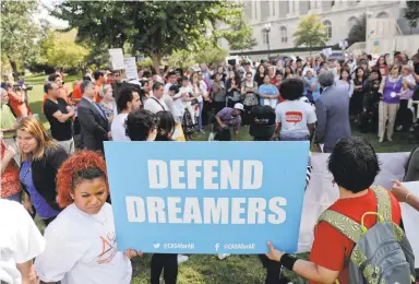  ?? PABLO MARTINEZ MONSIVAIS/ASSOCIATED PRESS FILE PHOTO ?? Immigrant rights supporters gather Sept. 26 at the U.S. Capitol in Washington. The White House sent out a long list of hard-line immigratio­n measures that the president is demanding in order to reach any deal to protect Dreamers.
