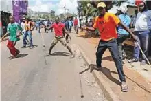  ?? Reuters ?? Voting was marred by skirmishes between police and stone-throwing opposition supporters, in counties including Kibera slum (pictured) in Nairobi, Kenya, yesterday.