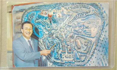  ?? PHOTOS: JASON PAYNE ?? Walt Disney shows off Disneyland in a vintage photo from the Disney exhibit at the Surrey Art Gallery.