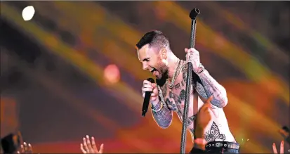  ?? JAMIE SQUIRE/GETTY ?? Adam Levine and Maroon 5 headlined the Super Bowl LIII Pepsi Halftime Show at Mercedes-Benz Stadium in Atlanta.