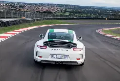  ??  ?? Gone is the large, fixed rear wing of the GT3 RS, replaced by a neat, subtle deployable wing that rises at speed.