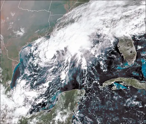  ?? NOAA ?? A satellite image Saturday shows Tropical Storm Beta in the Gulf of Mexico. Beta is expected to make landfall this week.