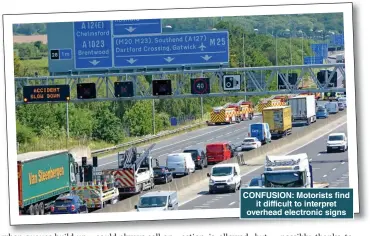  ??  ?? CONFUSION: Motorists find it difficult to interpret overhead electronic signs