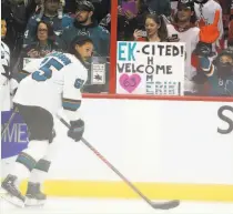  ?? Frank Gunn / Canadian Press ?? San Jose’s Erik Karlsson got a warm ovation from the crowd during warm-ups before the game in Ottawa, where the defenseman played for nine seasons.