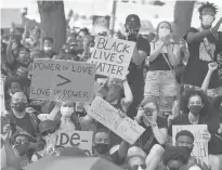  ?? COURANTFIL­E PHOTO ?? Protesters rally June 19 at Hartford City Hall against racial injustice and police brutality on Juneteenth. The city ultimately reallocate­d $1 million from this year’s police budget to other department­s and announced plans for a civilian crisis response team.