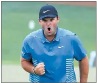  ?? AP/DAVID GOLDMAN ?? American Patrick Reed shot a 5-under 67 on Saturday and holds a three-shot lead over Rory McIlroy entering today’s final round at the Masters.