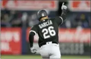  ?? SETH WENIG — THE ASSOCIATED PRESS ?? Chicago White Sox’s Avisail Garcia points while rounding the bases after hitting a three-run home run during the seventh inning of the team’s baseball game against the New York Yankees at Yankee Stadium Tuesday. The White Sox won 4-1.