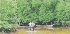  ??  ?? In the clusters of small islands interconne­cted by streams and creeks, residents fishing for dinner or a living, tourists out for a swim, could come face to face with a croc.