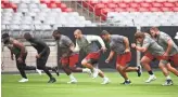  ??  ?? Arizona Cardinals run during the conditioni­ng test at training camp on Wednesday in Glendale. Players reported to camp amid a growing sense of national intrigue and drama.