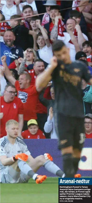  ?? FOTO: CARL RECINE ?? Arsenal- nedtur
Nottingham Forest's Taiwo Awoniyi fejrer kampens enlige mål, der betød, at Forest også spiller Premier League næste sæson, mens Manchester City nu er engelske mestre.