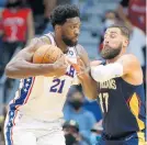  ?? ?? Joel Embiid drives against the Pelicans’ Jonas Valanciuna­s.