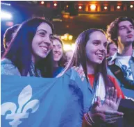  ?? ALLEN MCINNIS / POSTMEDIA NEWS ?? Bloc Québécois supporters at party leader Yves-François Blanchet’s election night event in Montreal on Monday.