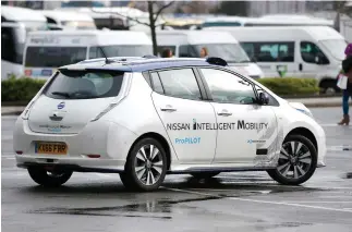  ??  ?? A modified Nissan Leaf, driverless car, is seen during its first demonstrat­ion on public roads in Europe, in London (Reuters)