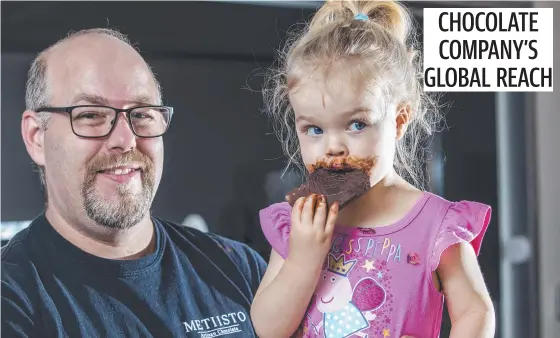  ?? Picture: David Martinelli ?? TOP CHOC: Toowoomba-based Metiisto Artisan Chocolate owner Trevor Smith, with his daughter Jamie in 2019, will start exporting to China within a few weeks.