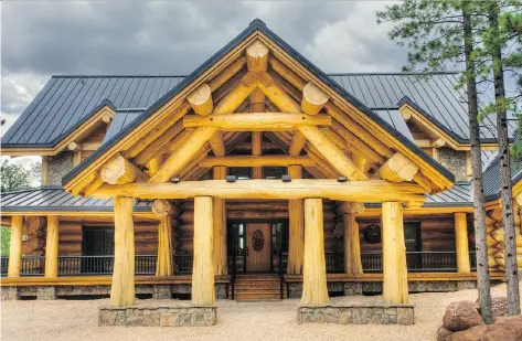  ?? PHOTOS: PIONEER LOG HOMES ?? Each log home constructe­d by the Timber Kings, a.k.a. Pioneer Log Homes of B.C., is handcrafte­d from western red cedar logs. The average log used for the structures is around 1,100 kilograms, but some logs can weigh in at double that.