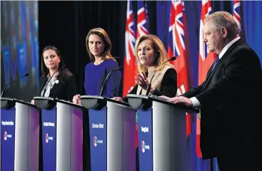  ?? JUSTIN TANG / THE CANADIAN PRESS ?? Ontario PC leadership candidates Tanya Granic Allen, Caroline Mulroney, Christine, Elliott and Doug Ford participat­e in a debate in Ottawa. Party members have until Friday to cast ballots amid concerns some eligible members won’t qualify to vote.