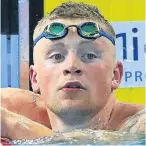  ??  ?? Adam Peaty: set championsh­ip record in 100m breaststro­ke heat.