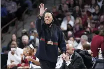  ?? SEAN RAYFORD — THE ASSOCIATED PRESS ?? South Carolina head coach Dawn Staley communicat­es with players during a second-round game against Miami in the NCAA women’s tournament Sunday in Columbia, S.C.
